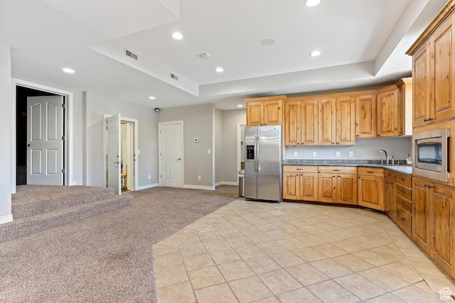 2333 S Falcon Way, Huntsville, UT 84317 - kitchen featuring stainless steel appliances, light colored carpet, a tray ceiling, recessed lighting, and baseboards