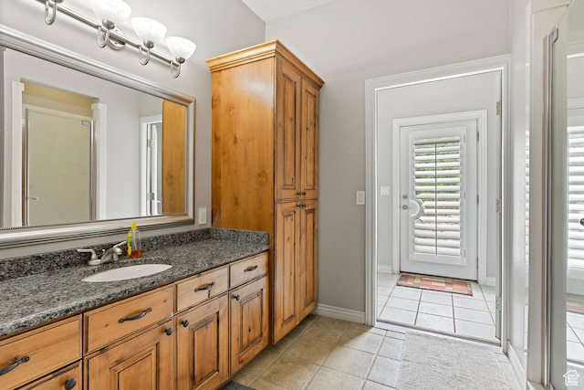 2333 S Falcon Way, Huntsville, UT 84317 - bathroom featuring tile patterned flooring, vanity, and baseboards