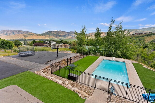 2333 S Falcon Way, Huntsville, UT 84317 - view of swimming pool featuring a mountain view and a trampoline