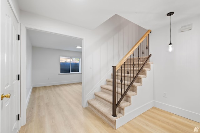 2859 W Country Classic Dr, Bluffdale, UT 84065 - stairway featuring wood finished floors and baseboards