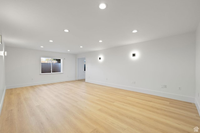 2859 W Country Classic Dr, Bluffdale, UT 84065 - spare room featuring recessed lighting, baseboards, and light wood-style floors