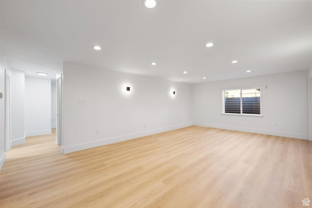 2859 W Country Classic Dr, Bluffdale, UT 84065 - empty room with recessed lighting, light wood-type flooring, and baseboards