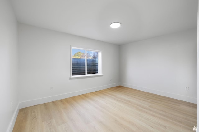 2859 W Country Classic Dr, Bluffdale, UT 84065 - unfurnished room featuring baseboards and light wood finished floors