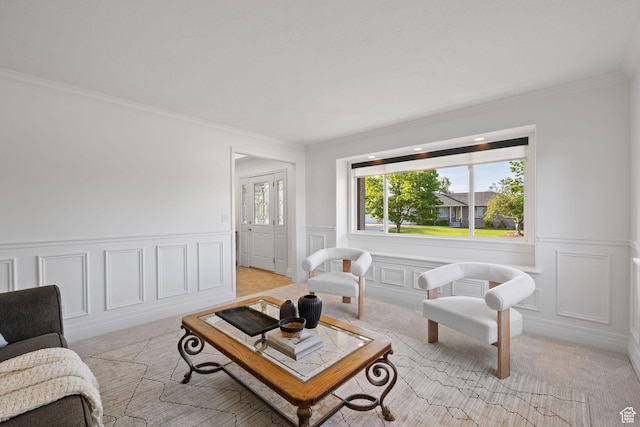 2859 W Country Classic Dr, Bluffdale, UT 84065 - living room with light colored carpet, a decorative wall, crown molding, and wainscoting