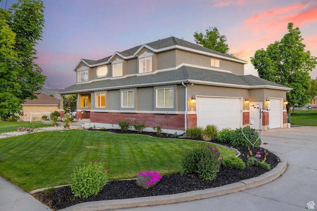 2859 W Country Classic Dr, Bluffdale, UT 84065 - view of front of property featuring stucco siding, an attached garage, concrete driveway, and a front lawn