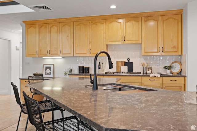 2859 W Country Classic Dr, Bluffdale, UT 84065 - kitchen with light brown cabinets, backsplash, a sink, recessed lighting, and crown molding