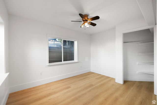 2859 W Country Classic Dr, Bluffdale, UT 84065 - unfurnished bedroom with light wood-style floors, baseboards, a closet, and ceiling fan