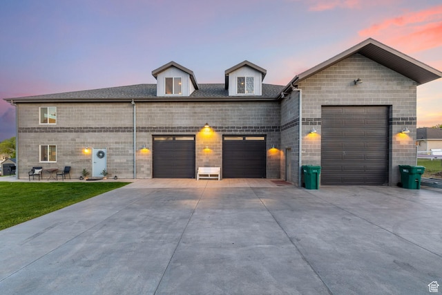 2859 W Country Classic Dr, Bluffdale, UT 84065 - view of front facade featuring an attached garage, concrete driveway, and a front yard