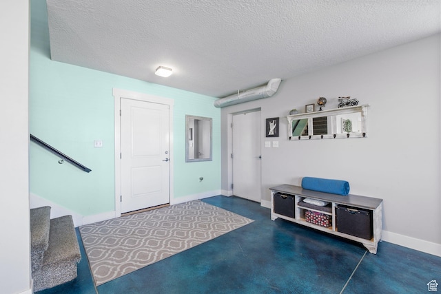 2859 W Country Classic Dr, Bluffdale, UT 84065 - entryway featuring stairs, a textured ceiling, and baseboards