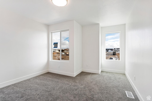 1667 W 2770 S Unit 206, Syracuse, UT 84075 - carpeted empty room featuring baseboards