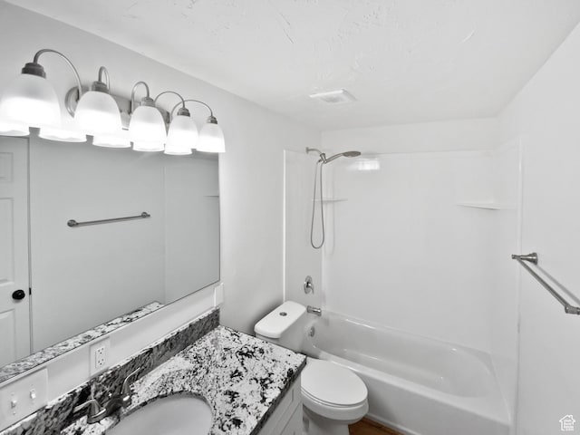 full bathroom featuring toilet, shower / bath combination, and vanity