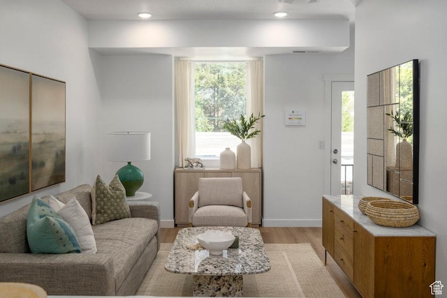 317 W Azure Sky Ln Unit 5-23, Salt Lake City, UT 84103 - living area featuring light wood-type flooring and baseboards