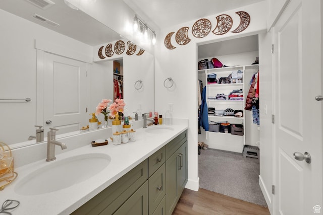 1293 N 3960 W Unit 457, Lehi, UT 84043 - full bath with double vanity, a spacious closet, and wood finished floors