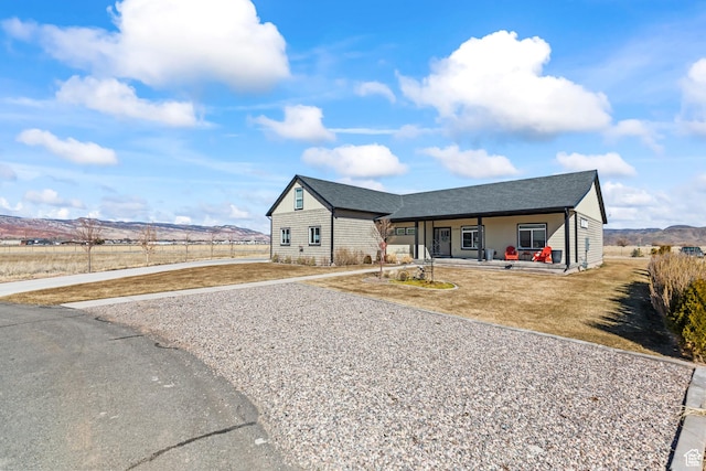 2201 S 380 W, Richfield, UT 84701 - ranch-style house featuring driveway, covered porch, fence, and roof with shingles