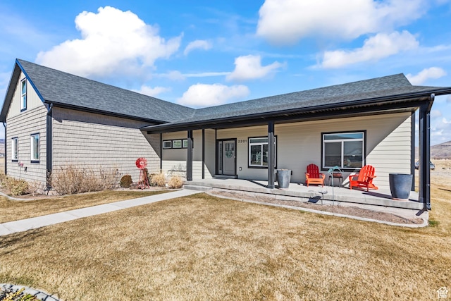 2201 S 380 W, Richfield, UT 84701 - view of front of house featuring a porch, a shingled roof, and a front lawn