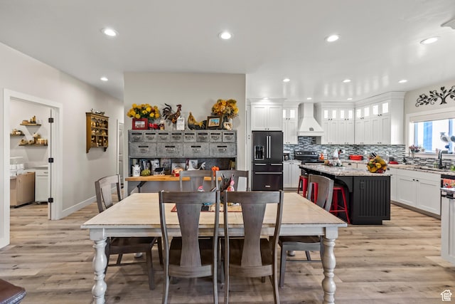 2201 S 380 W, Richfield, UT 84701 - dining space featuring light wood finished floors, recessed lighting, and baseboards