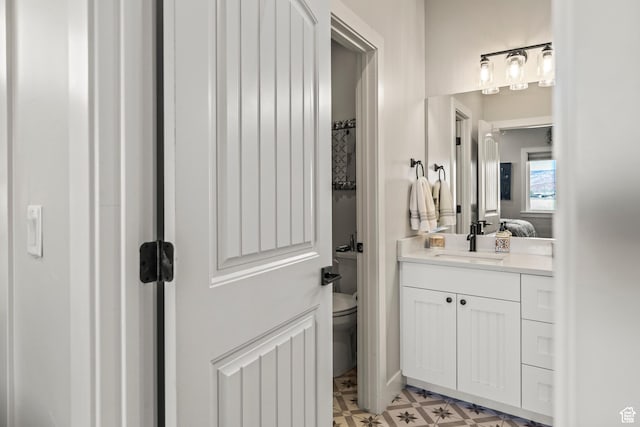 2201 S 380 W, Richfield, UT 84701 - bathroom with vanity, toilet, tile patterned floors, and connected bathroom