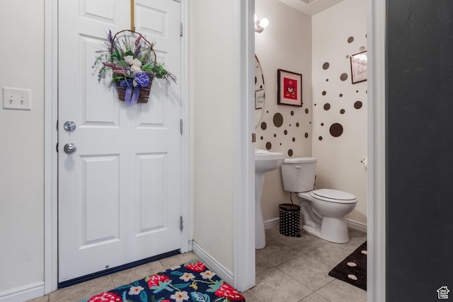 920 W Stonehaven Dr, North Salt Lake, UT 84054 - bathroom with tile patterned flooring, toilet, and baseboards