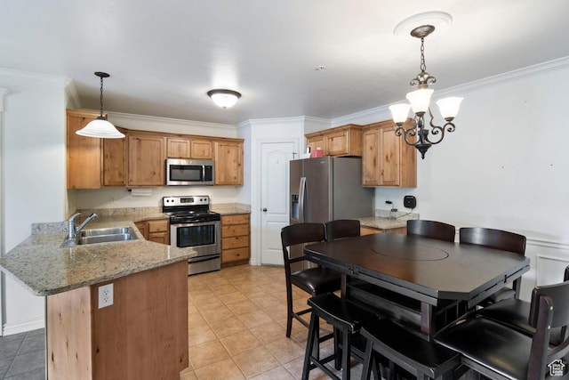 661 S 2220 W Unit 202, Pleasant Grove, UT 84062 - kitchen featuring appliances with stainless steel finishes, a sink, a peninsula, a chandelier, and crown molding