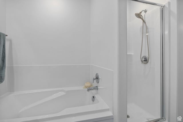 2256 E Boxwood Ln, Eagle Mountain, UT 84005 - bathroom featuring a stall shower and a bathtub