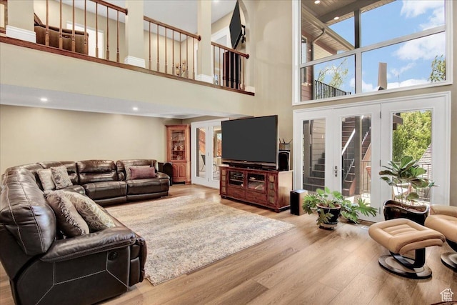 875 E Burch Creek Holw S, South Ogden, UT 84403 - living area featuring a towering ceiling, wood finished floors, french doors, and recessed lighting
