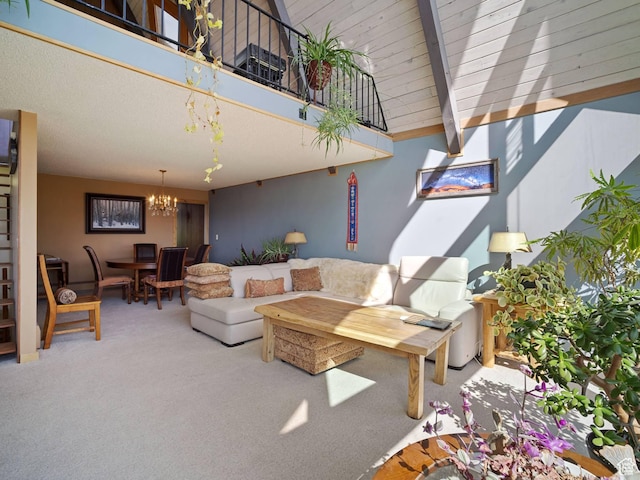 360 Crestview Dr, Park City, UT 84098 - carpeted living area with a chandelier, beam ceiling, and high vaulted ceiling