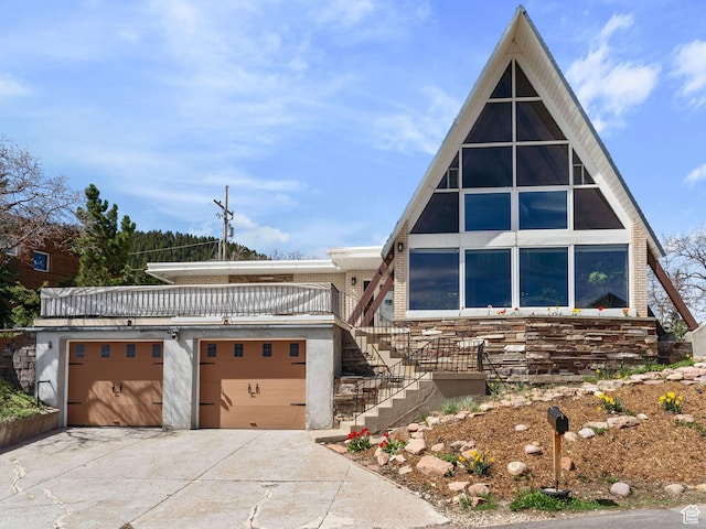 360 Crestview Dr, Park City, UT 84098 - view of front of home featuring driveway and an attached garage