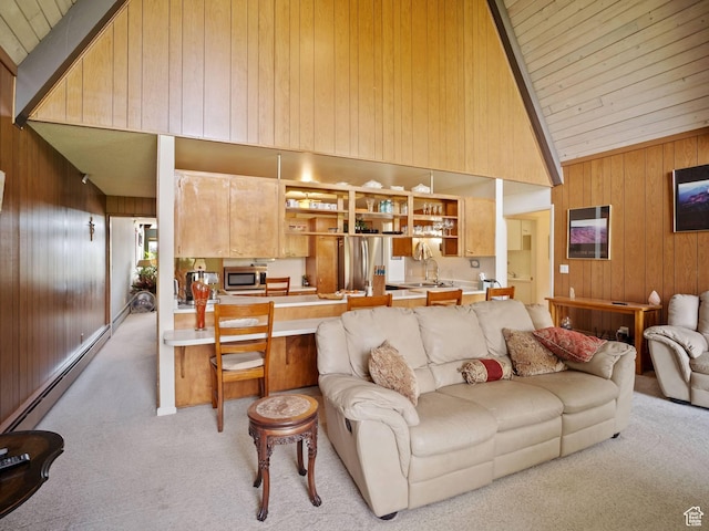 360 Crestview Dr, Park City, UT 84098 - living room with light colored carpet, wooden walls, high vaulted ceiling, baseboard heating, and wood ceiling