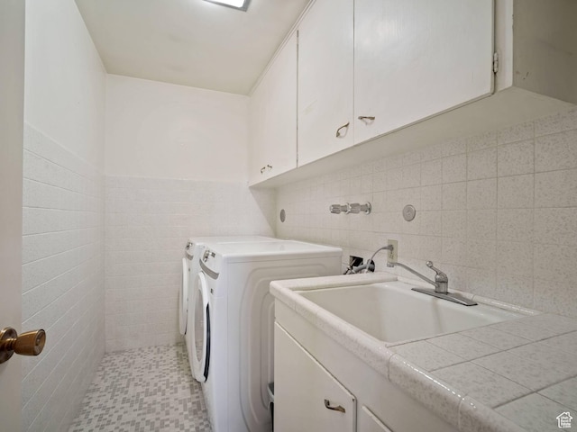 360 Crestview Dr, Park City, UT 84098 - clothes washing area featuring tile walls, cabinet space, and separate washer and dryer