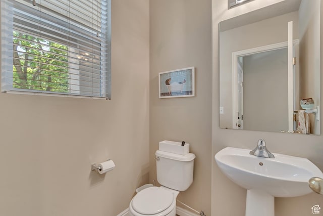 1524 W Napa Ave S, Bluffdale, UT 84065 - bathroom featuring a sink, toilet, and baseboards