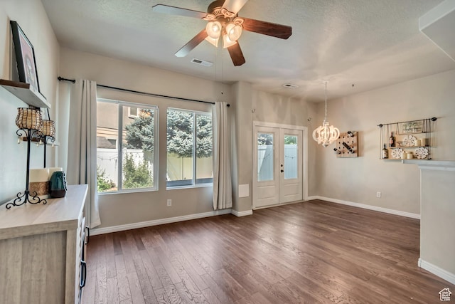 1524 W Napa Ave S, Bluffdale, UT 84065 - entryway featuring dark wood-style floors, baseboards, a chandelier, a ceiling fan, and a textured ceiling
