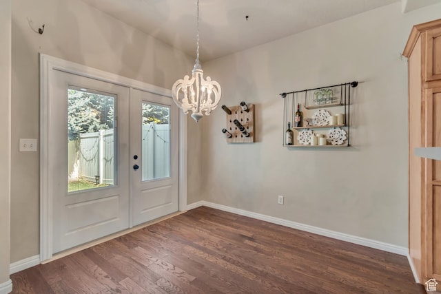 1524 W Napa Ave S, Bluffdale, UT 84065 - doorway to outside featuring dark wood-style flooring, a chandelier, and baseboards