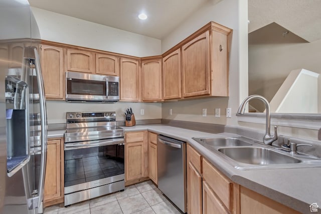 1524 W Napa Ave S, Bluffdale, UT 84065 - kitchen featuring stainless steel appliances, a sink, light tile patterned flooring, light countertops, and recessed lighting