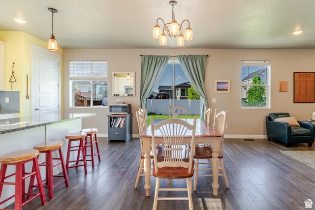 1517 E Kelsey Dr, Eagle Mountain, UT 84005 - dining space with healthy amount of natural light, baseboards, and recessed lighting