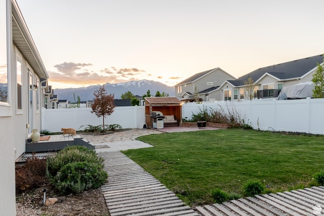 1517 E Kelsey Dr, Eagle Mountain, UT 84005 - view of yard with a patio area, a shed, an outdoor structure, a deck with mountain view, and a residential view