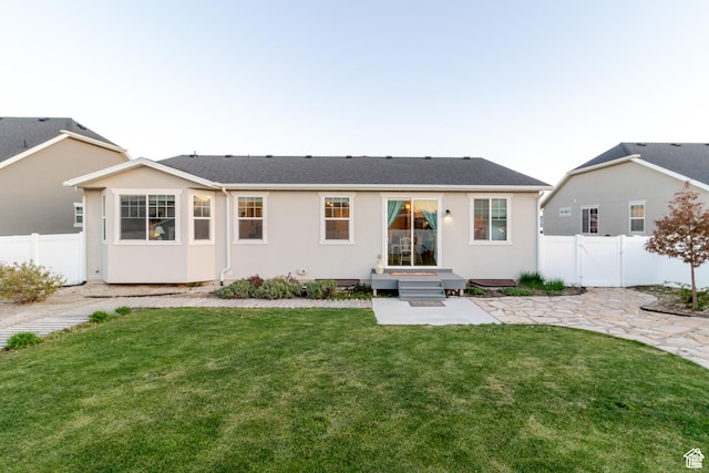 1517 E Kelsey Dr, Eagle Mountain, UT 84005 - rear view of house with a patio area and stucco siding