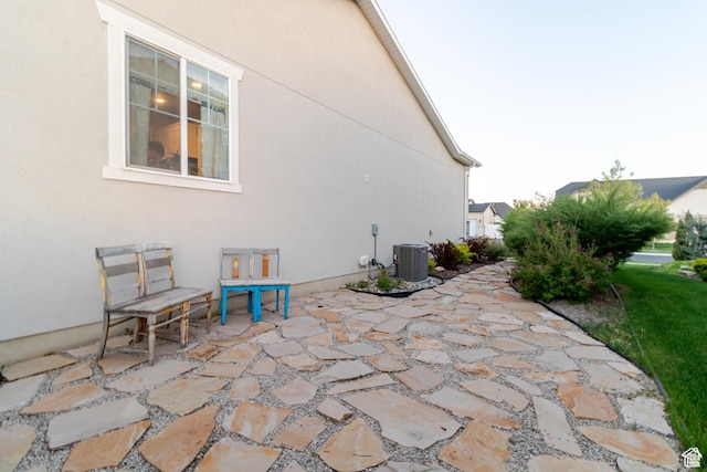 1517 E Kelsey Dr, Eagle Mountain, UT 84005 - view of patio / terrace featuring central AC unit
