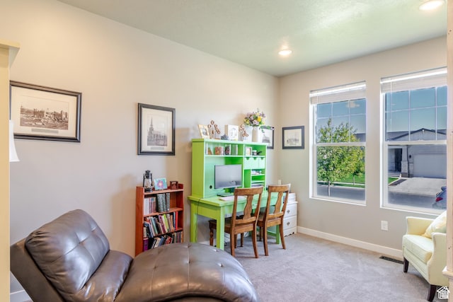 1517 E Kelsey Dr, Eagle Mountain, UT 84005 - sitting room with light colored carpet, baseboards, and recessed lighting