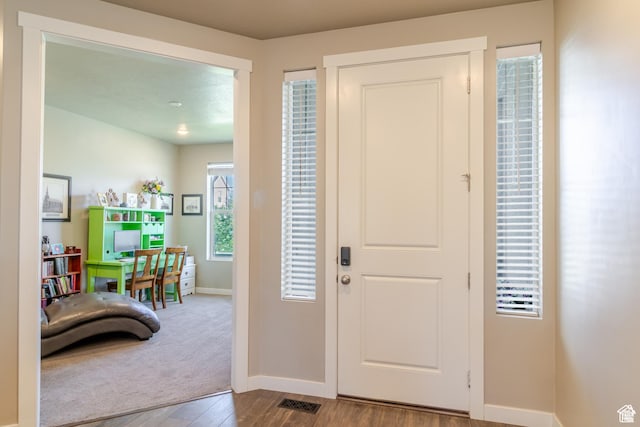 1517 E Kelsey Dr, Eagle Mountain, UT 84005 - entrance foyer featuring baseboards and wood finished floors