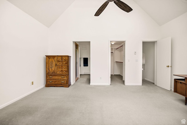 1729 N 1700 E, North Logan, UT 84341 - unfurnished bedroom with light colored carpet, baseboards, a spacious closet, baseboard heating, and high vaulted ceiling