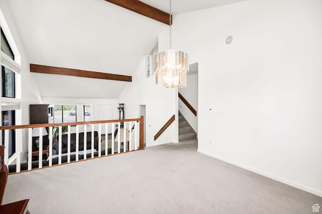 1729 N 1700 E, North Logan, UT 84341 - carpeted spare room featuring beamed ceiling, high vaulted ceiling, a chandelier, and baseboards