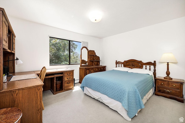 1729 N 1700 E, North Logan, UT 84341 - bedroom with light colored carpet, a desk, and a baseboard heating unit