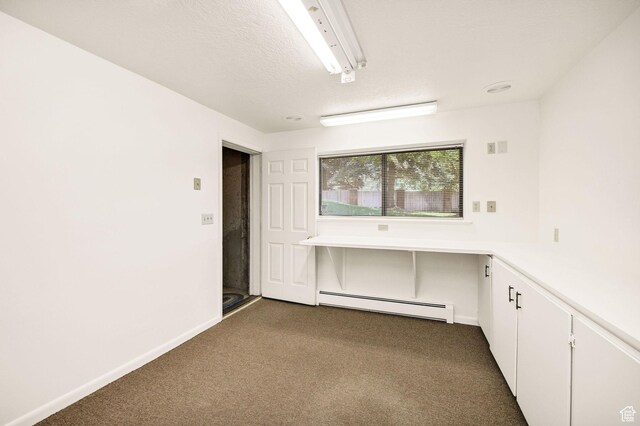 1729 N 1700 E, North Logan, UT 84341 - empty room with baseboard heating, dark colored carpet, and baseboards