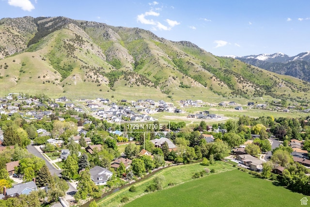 1729 N 1700 E, North Logan, UT 84341 - aerial overview of property's location with mountains and nearby suburban area