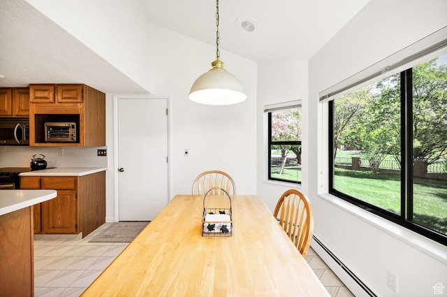 1729 N 1700 E, North Logan, UT 84341 - dining area with a baseboard radiator and light tile patterned floors