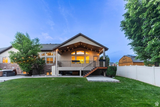 2378 S 550 W, Syracuse, UT 84075 - rear view of property with a patio, stairs, a wooden deck, and stucco siding