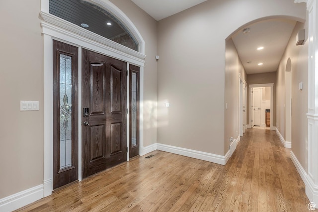 2378 S 550 W, Syracuse, UT 84075 - entryway featuring arched walkways, light wood finished floors, baseboards, and recessed lighting
