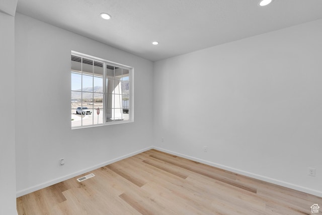 241 W 825 S Unit 305, Willard, UT 84340 - empty room featuring recessed lighting, light wood finished floors, and baseboards