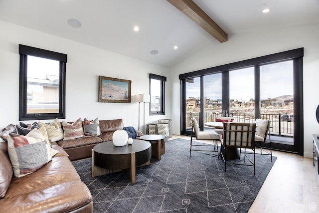 living area featuring wood finished floors and recessed lighting