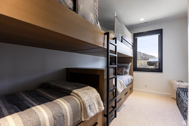 carpeted bedroom with baseboards and recessed lighting